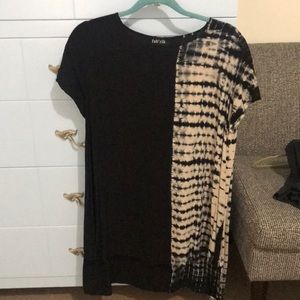 Fabrik dress black and white. Longer in the back